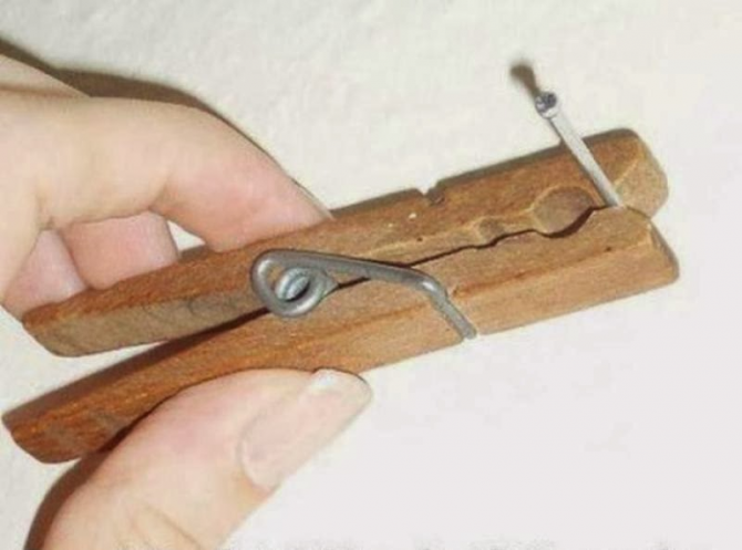 Use a clamp to hold the nails